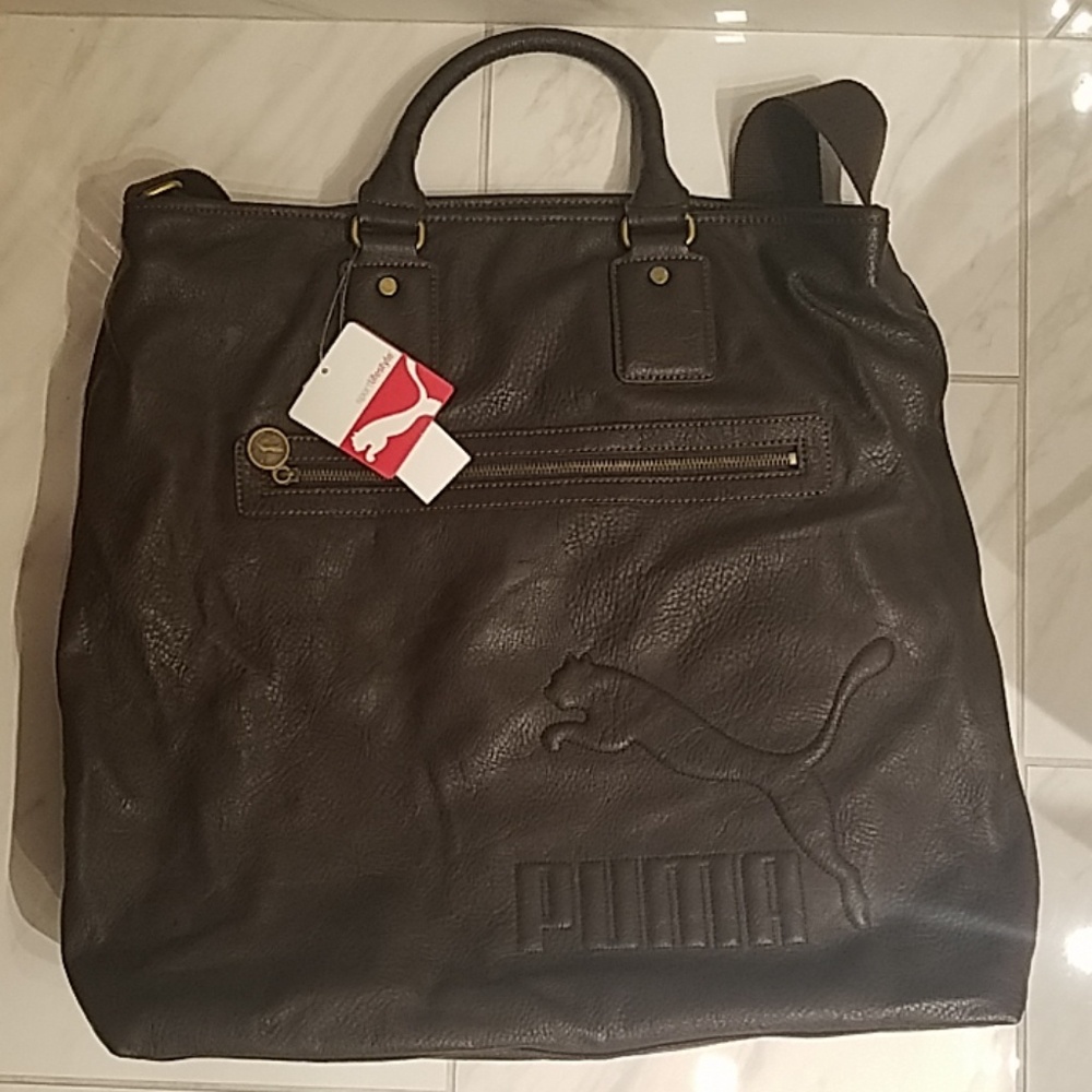 Puma brown travel bag with laptop support slot